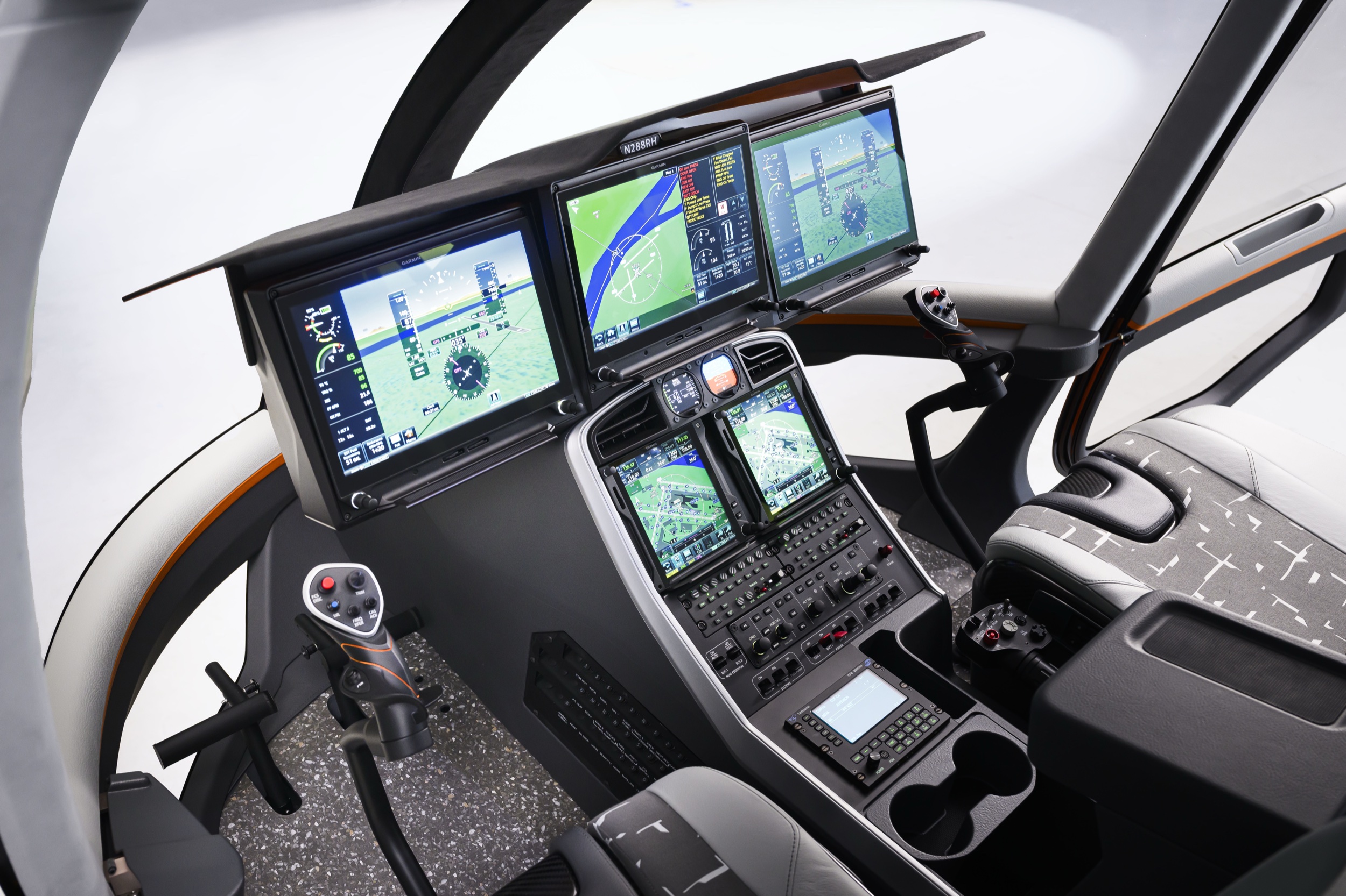 Robinson R88 glass cockpit, wide view of the instrument panel