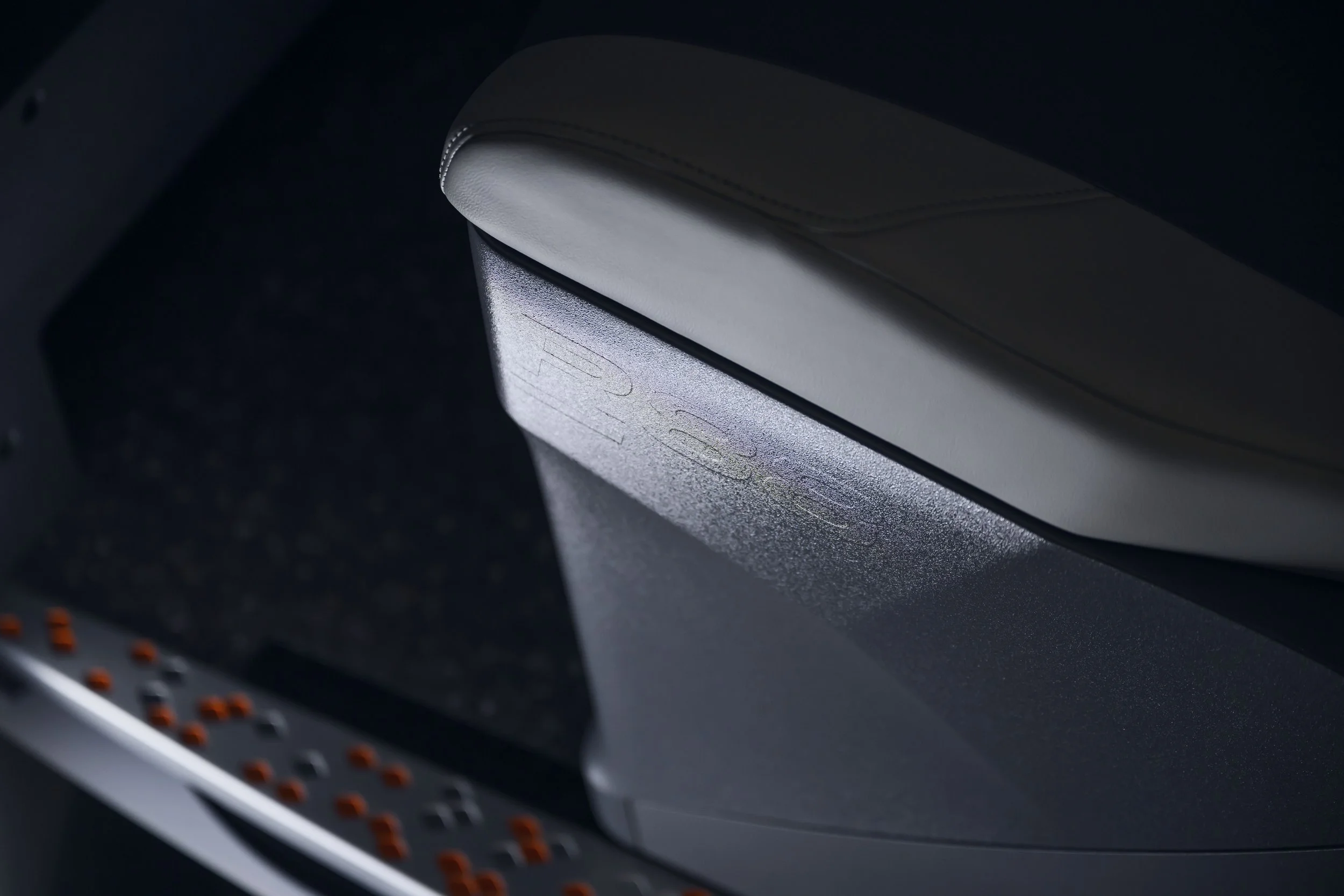R88 embossed seat logo detail