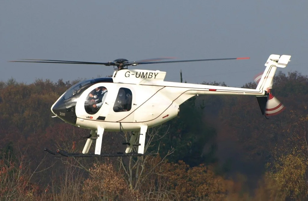 Hughes 500 in flight