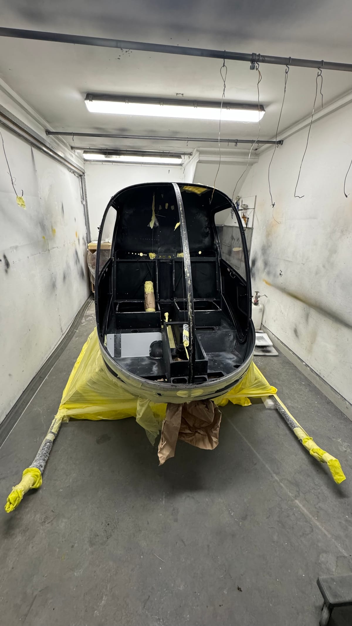 Helicopter cabin shell in the paint booth