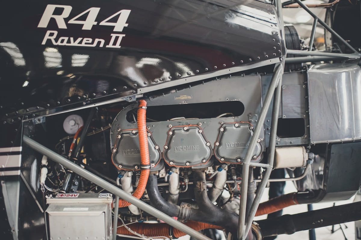 Robinson R44 Raven II with engine exposed during a rebuild