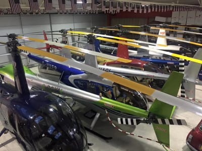 Robinson helicopters inside the HQ Aviation hangar at Denham Aerodrome