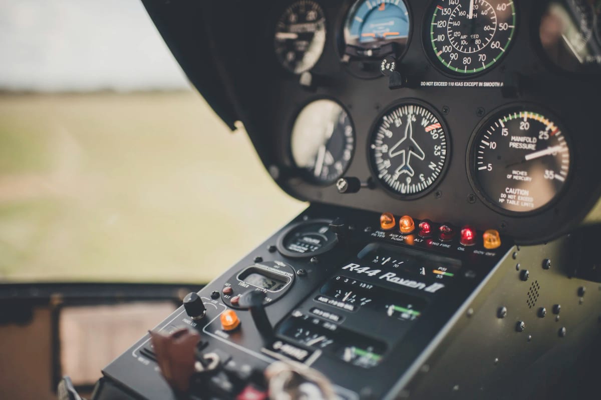 Helicopter trial lesson taking off from Denham Aerodrome